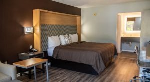 Standard King Room with pillowtop bed and flat-screen TV